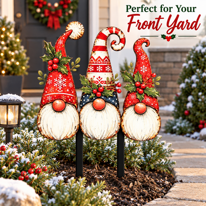 Christmas gnome garden stakes displayed in a festive front yard